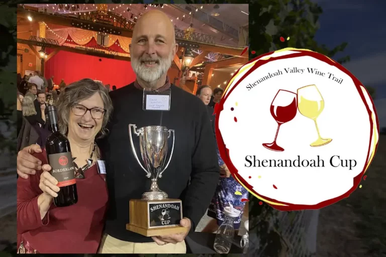 Jump Mountain Vineyard owners holding the Shenandoah Cup trophy and winning wine Borderland